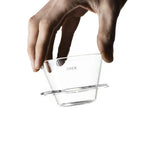 Person holding the Orea V1 brewer in their hand.