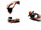 A split-panel product shot of the OREA O2 Darth Black Brewer with its signature orange #8 Regulator; the left panel shows the dripper being lowered onto a black base, while the right panel shows the fully assembled brewer and regulator being held comfortably in a hand.