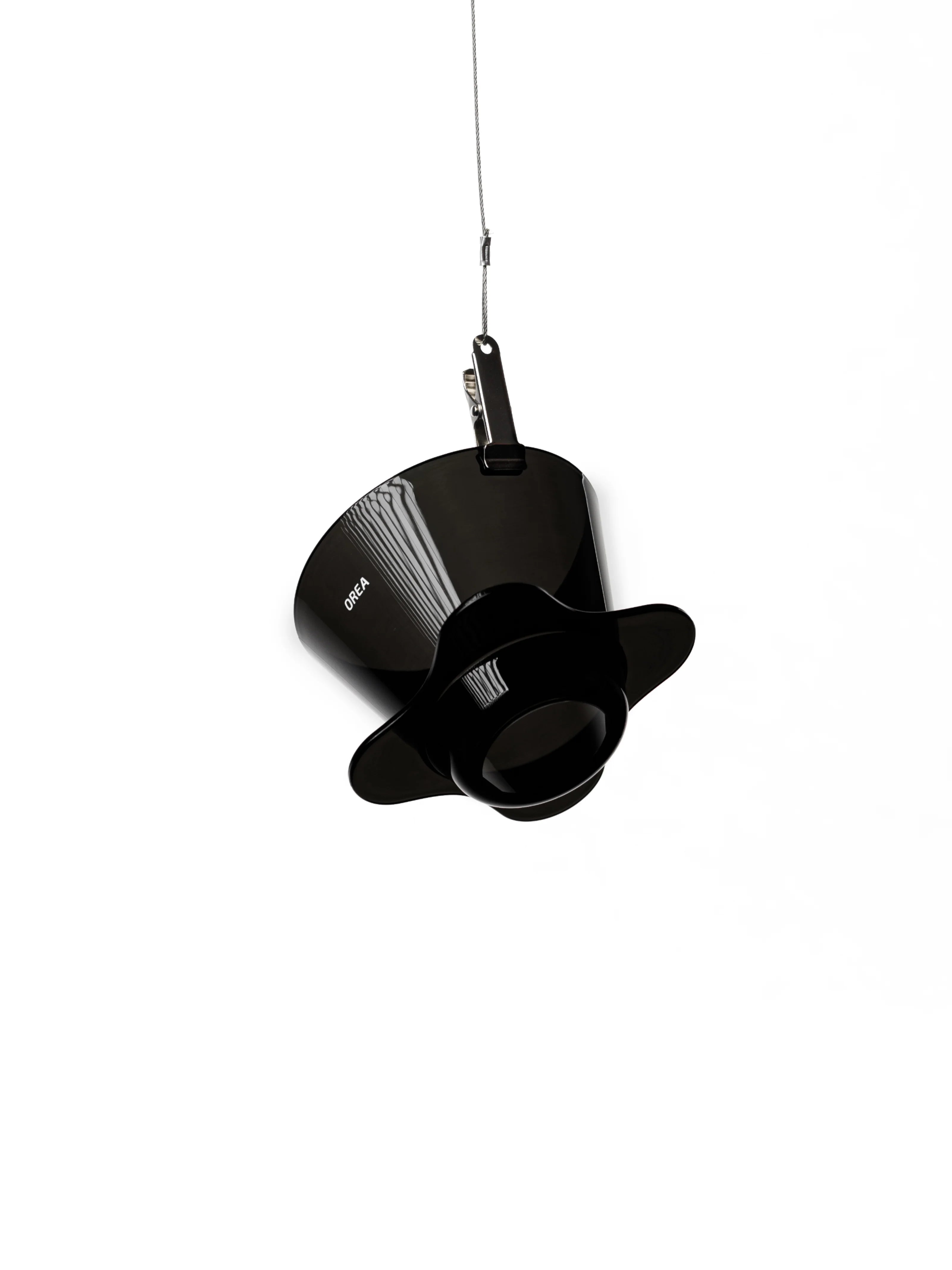 The OREA O2 Darth Black Brewer hanging delicately from a single string against a pure white background, showcasing its lightweight 67g unibody construction and minimalist aesthetic.