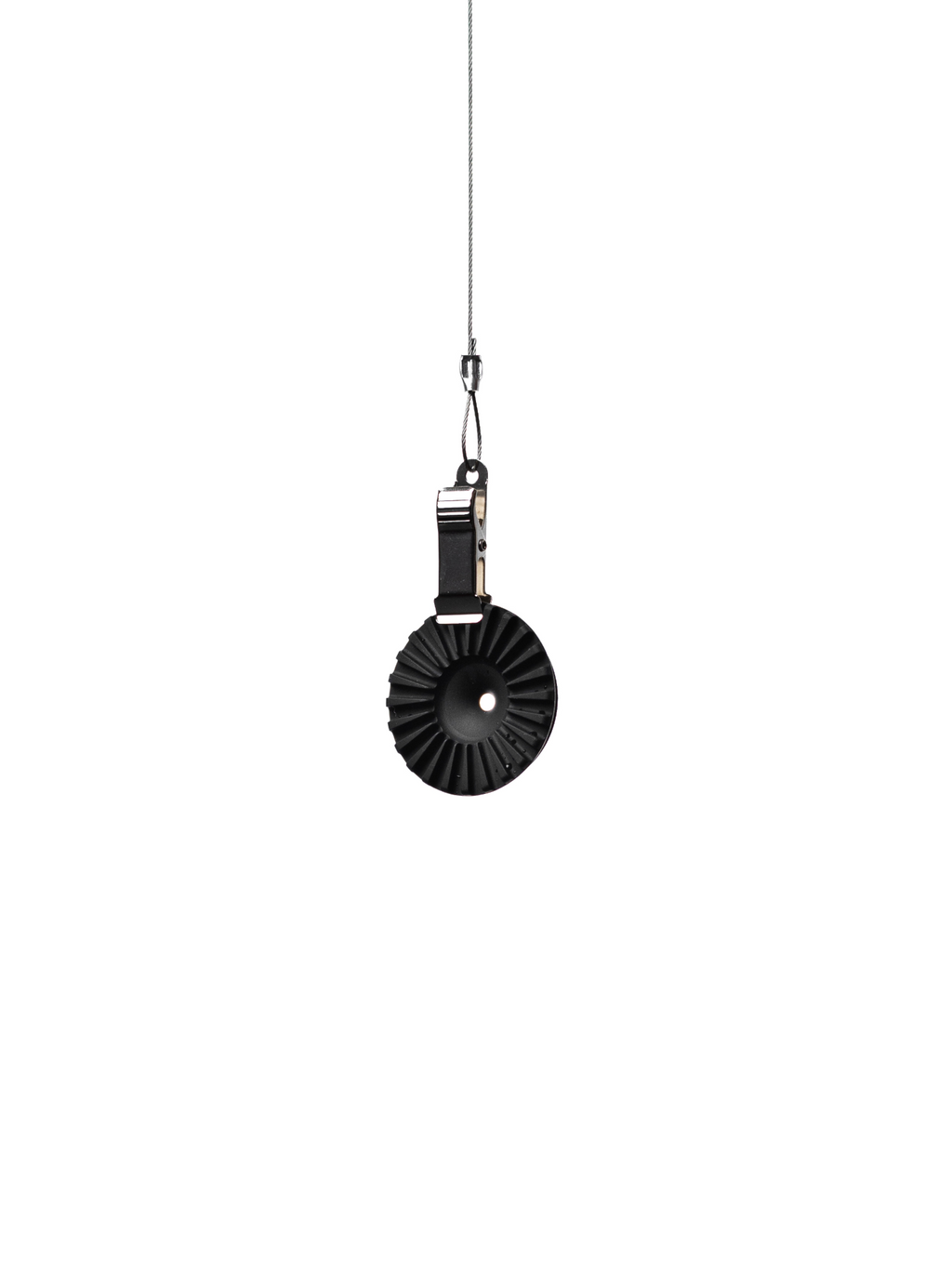 The black OREA #4 Medium Regulator hanging delicately by a small metal clip on a wire against a white background, emphasizing its incredibly lightweight, food-grade silicone construction and minimalist design.